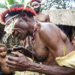 Papuan_Man_Harvest_Feast