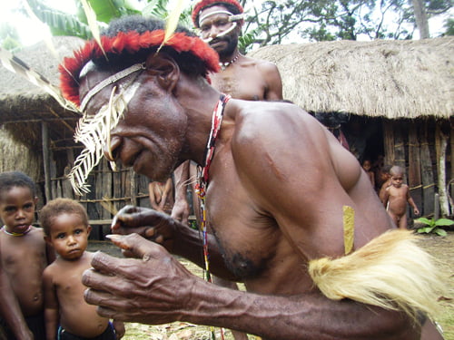 Papuan_Man_Harvest_Feast