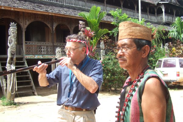 Tourist_Testing_His_Skill_with_Blowpipe_Dayak_Banuak_Central_Borneo